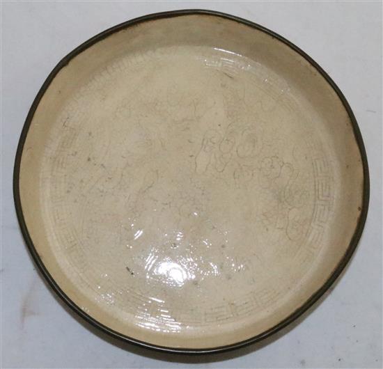 A Ding type moulded dragon dish, possibly Cizhou, Song-Jin dynasty, 20cm